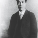 Image of Hirata wearing a suit