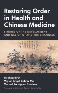 a bookcover with a chinese print for Restoring Order in Chinese Medicine